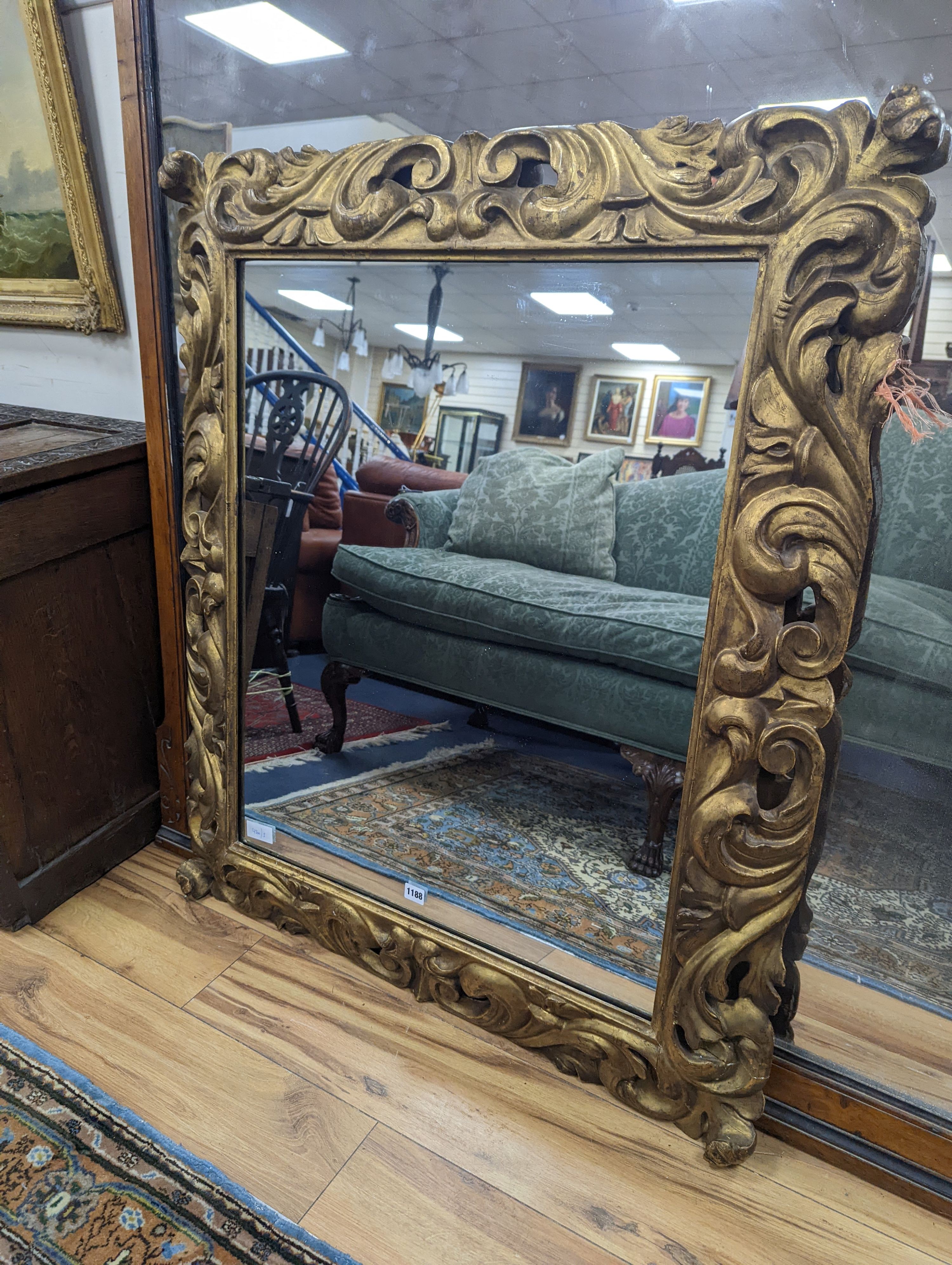 A 19th century French carved giltwood wall mirror with acanthus scroll frame, width 91cm, height 108cm